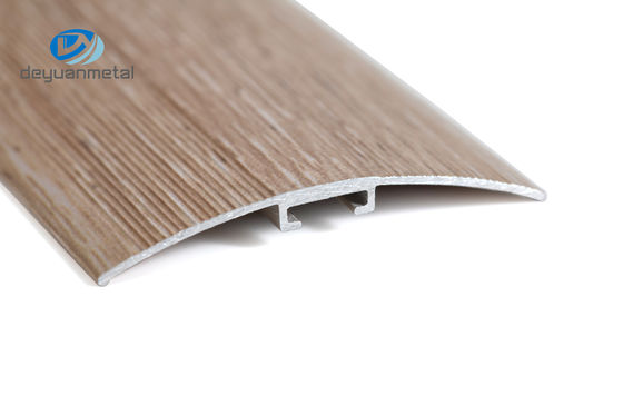Die 6463 legen Aluminiumfußbodenprofil-Schwellen-Streifen-Übergangs-Ordnungs-Laminat Oberflächen-Behandlungs-Holz-Korn mit Teppich aus