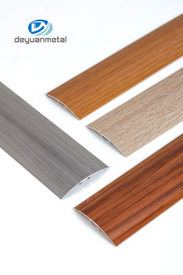 Die 6463 legen Aluminiumfußbodenprofil-Schwellen-Streifen-Übergangs-Ordnungs-Laminat Oberflächen-Behandlungs-Holz-Korn mit Teppich aus